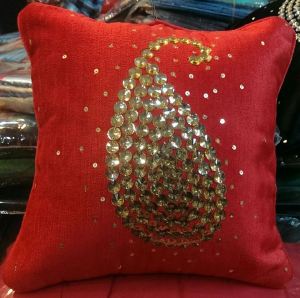red beaded cushion